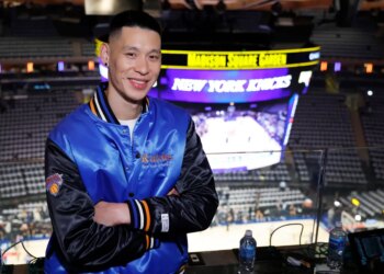 Jeremy Lin posing in a New York Knicks jacket before game 3 of the 2026 NBA Finals.