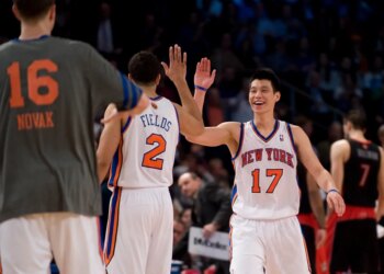 Jeremy Lin is greeted by #2 Landry fields during the fourth quarter of a 2012 game.