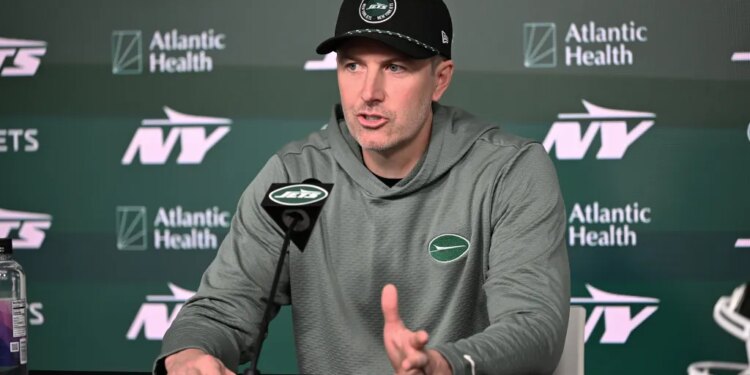 Jets general manager Darren Mougey speaking to media at a press conference.