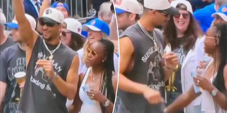 Josh Hart's wife touches his behind in viral Knicks parade moment