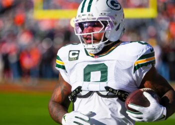 Green Bay Packers running back Josh Jacobs warms up before an NFL football game against the Denver Broncos, Dec. 14, 2025, in Denver.