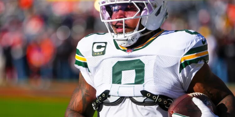 Green Bay Packers running back Josh Jacobs warms up before an NFL football game against the Denver Broncos, Dec. 14, 2025, in Denver.