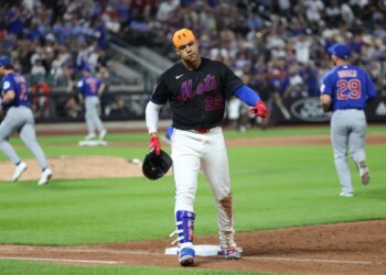 New York Mets left fielder Juan Soto #22 reacts after grounding out with the bases loaded at Citi Field.