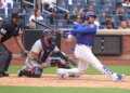 New York Mets left fielder Juan Soto (22) two-run single during the eighth inning when the New York Mets played the Atlanta Braves Sunday, June 14, 2026 at Citi Field in Queens, NY.