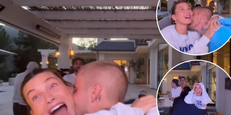 Justin Bieber kisses wife Hailey in celebration of long awaited Knicks title