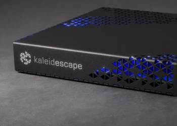 The Kaleidescape Strato E player on a gray surface.