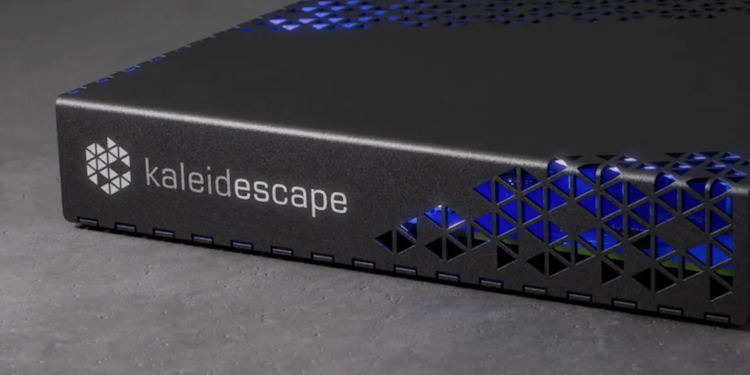 The Kaleidescape Strato E player on a gray surface.