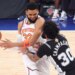 Karl-Anthony Towns struggles to make a move on Julian Champagnie during the Knicks' Game 3 loss to the Spurs at the Garden.
