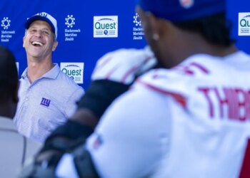John Harbaugh has a laugh as he takes a question from Kayvon Thibodeaux during a press conference with reporters after Giants practice on June 9, 2026.