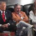 Donald Trump, James Dolan, and Kai Trump watching the NBA Finals.