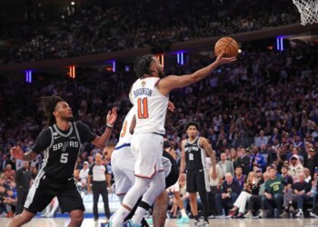 New York Knicks guard Jalen Brunson #11 goes up for a shot against San Antonio Spurs #5 during Game 3 of the 2026 NBA Finals.