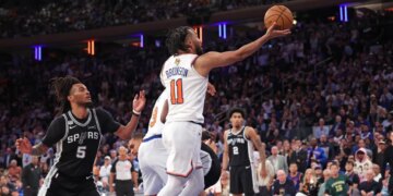 New York Knicks guard Jalen Brunson #11 goes up for a shot against San Antonio Spurs #5 during Game 3 of the 2026 NBA Finals.