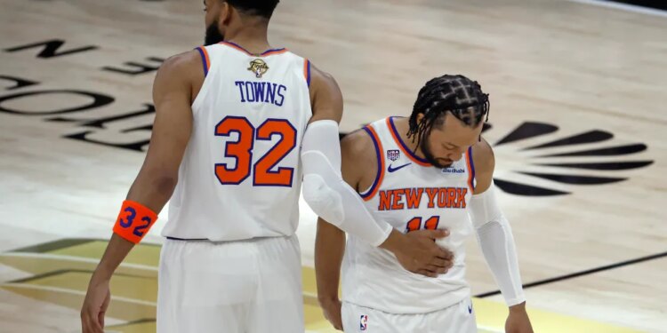 New York Knicks center Karl-Anthony Towns (32) greets New York Knicks guard Jalen Brunson (11) before the start of game 1 of the 2026 NBA Finals.