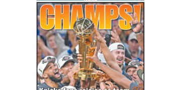 New York Post cover showing Knicks fans celebrating their team's first title in 53 years, with players holding the NBA championship trophy.