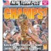 New York Post cover showing Knicks fans celebrating their team's first title in 53 years, with players holding the NBA championship trophy.