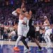New York Knicks vs. San Antonio Spurs at Madison Square Garden - New York Knicks center Karl-Anthony Towns #32 rebounds the ball away from San Antonio Spurs guard Dylan Harper #2 in the 2nd quarter.