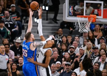 San Antonio Spurs forward Victor Wembanyama, right, blocks a shot by Oklahoma City Thunder center Isaiah Hartenstein during the second half of Game 4 in the Western Conference finals NBA basketball playoffs series in San Antonio, Sunday, May 24, 2026.