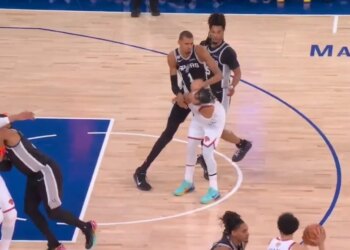 The Spurs' Victor Wembanyama (1) shoves Knicks guard Jalen Brunson (11) in the back of the head during Game 3 of the NBA Finals at MSG on June 8, 2026.