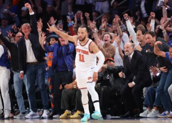 New York Knicks guard Jalen Brunson #11 reacts after hitting a three-point shot in Game 3 of the 2026 NBA Finals.