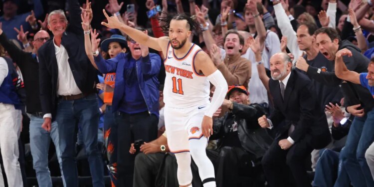 New York Knicks guard Jalen Brunson #11 reacts after hitting a three-point shot in Game 3 of the 2026 NBA Finals.