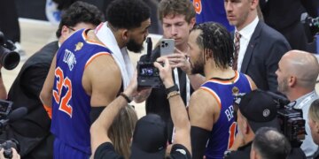 Karl-Anthony Towns and Jalen Brunson celebrate after the Knicks' Game 2 win over the Spurs.