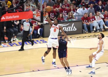 New York Knicks forward Og Anunoby (8) goes up for a dunk during the fourth quarter.