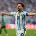 Lionel Messi celebrating a goal during a World Cup match.