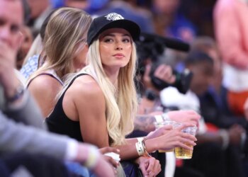 Influencer Livvy Dunne on celebrity row at Madison Square Garden.