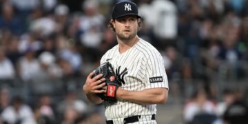 New York Yankees pitcher Gerrit Cole stands on the mound.