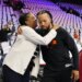 Jalen Brunson hugs his mother, Sandra Brunson, during warm-ups for an NBA Playoffs game.