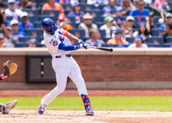 New York Mets second baseman Marcus Semien (10) hitting a two-run home run.