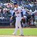 New York Mets pitcher Nolan McLean #26 reacts as he walks off the field after ending the sixth inning giving up a three-run home run.
