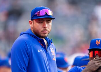 Francisco Alvarez in the dugout during a game.