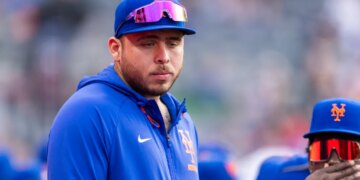 Francisco Alvarez in the dugout during a game.