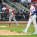 David Peterson looks down at the ground after giving up a two-run homer to Nelson Velázquez who round the bases in the third inning of the Mets' 9-2 loss to the Cardinals at Citi Field.