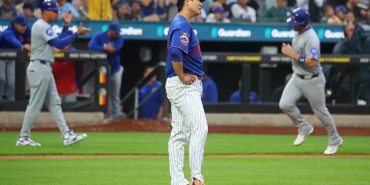 Mets starter Kodai Senga (c.) reacts after giving up a three-run against the Cubs on June 23, 2026.