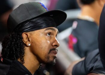 Close-up of New York Mets shortstop Francisco Lindor in the dugout.
