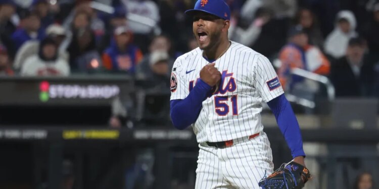 New York Mets pitcher Freddy Peralta (51) reacting after ending the sixth inning against the Detroit Tigers.