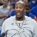 Head coach Mike Brown wears rapper Fat Joes’ chain as he addresses the crowd after the Knicks' 94-90 NBA title-clinching Game 5 win over the Spurs on July 13, 2026.
