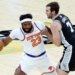 Mitchell Robinson looks to make a move on Luke Kornet during the first quarter of the Knicks' 105-95 Game 1 win over the Spurs in the NBA Finals on June 3, 2026 in San Antonio.