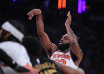 New York Knicks center Mitchell Robinson (23) shooting a free throw.