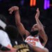 New York Knicks center Mitchell Robinson (23) shooting a free throw.