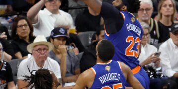 Mitchell Robinson blocks Stephon Castle's shot during the second half of the Knicks' 105-104 win over the Spurs in Game 2 of the NBA Finals on June 5, 2026 in San Antonio.