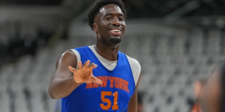New York Knicks forward Mohamed Diawara (51) smiles during practice on media day for the 2026 NBA Finals at Frost Bank Center.