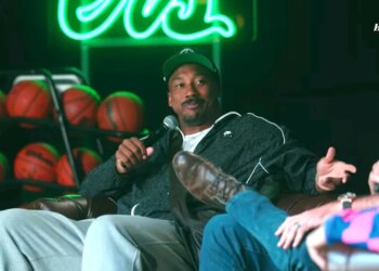 Myles Garrett speaking into a microphone.