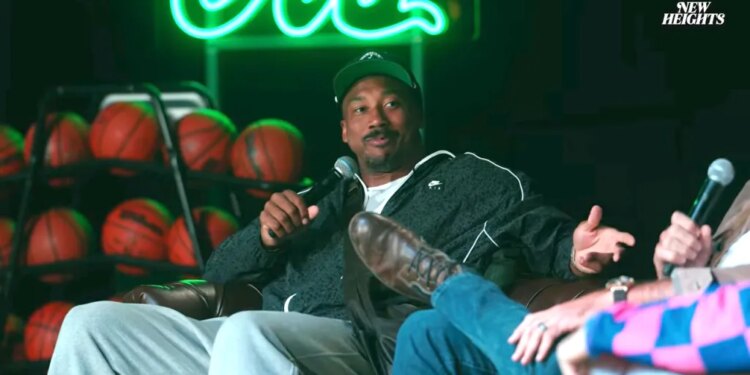 Myles Garrett speaking into a microphone.