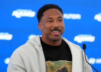 Rams defensive end Myles Garrett talks to reporters at a press conference at the team's practice facility on June 2026.