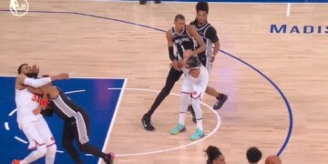 The Spurs' Victor Wembanyama (1) shoves Knicks guard Jalen Brunson (11) in the back of the head during Game 3 of the NBA Finals on June 8, 2026.