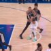 The Spurs' Victor Wembanyama (1) shoves Knicks guard Jalen Brunson (11) in the back of the head during Game 3 of the NBA Finals on June 8, 2026.