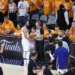 New York Knicks guard Jalen Brunson speaks with a referee after not receiving a foul call.